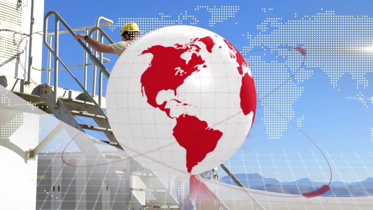 Animation of globe and world map over engineer and wind turbine