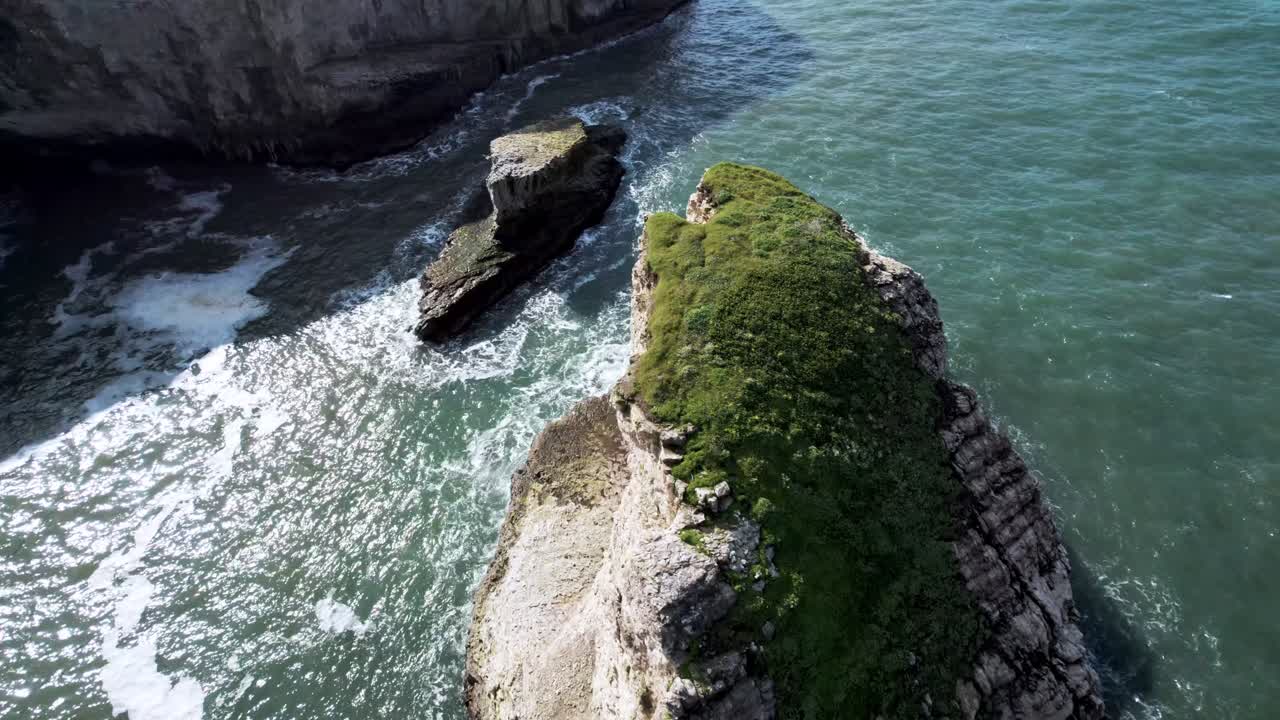 Dramatic Ocean Cliffs on the West Coast with Waves Crashing Against Rocks
