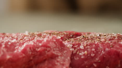 seasoning raw beef steak