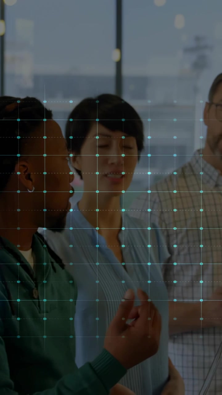 Vertical video: Lead gesturing, causing neon data wave sweeping past, tablet tapping, business plan