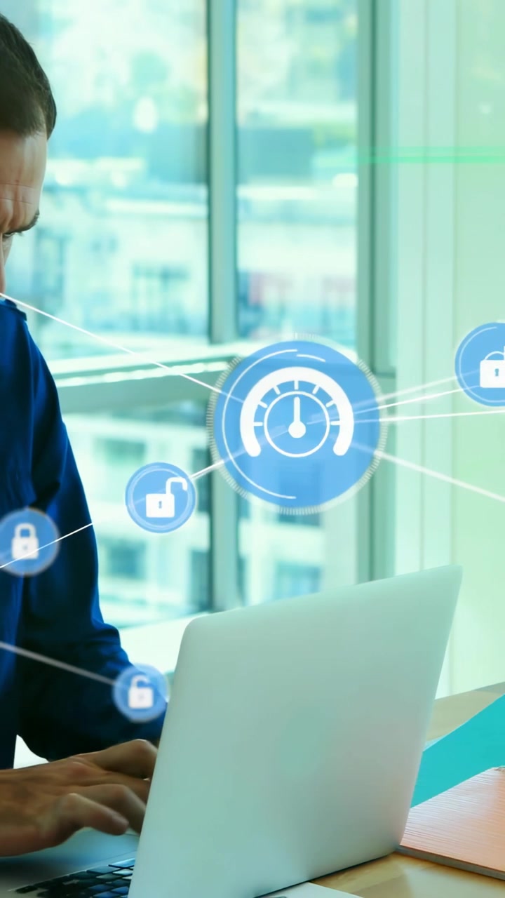 Vertical video: Man typing on laptop causing blue HUD icons, forming secure network, taking folder