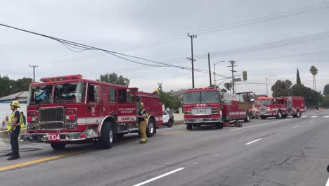 convoy of fire trucks at scene