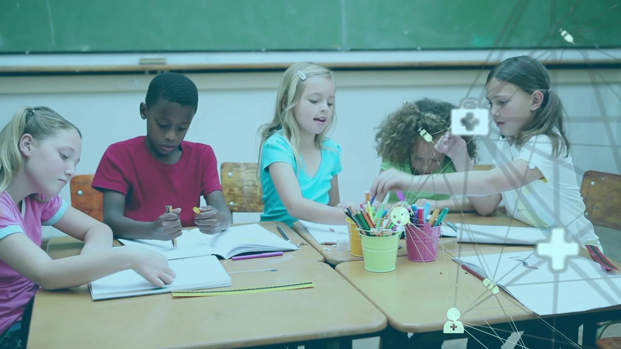 Elementary students opening notebooks grabbing colored pencils and coloring in classroom lesson
