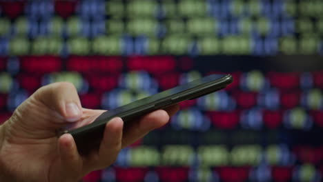 person using a smartphone in a stadium