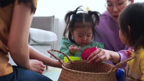 mothers and babies in living room