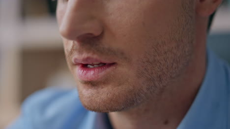 smiling man face working office extreme closeup. joyful handsome businessman