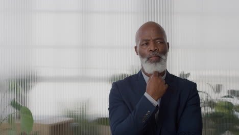 portrait-successful-senior-african-american-businessman-brainstorming-ideas-looking-pensive-mature-black-executive-pacing-in-office-thinking-slow-motion-focused-ambition