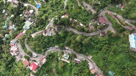 high aerial view over winding mountain roads of cebu city