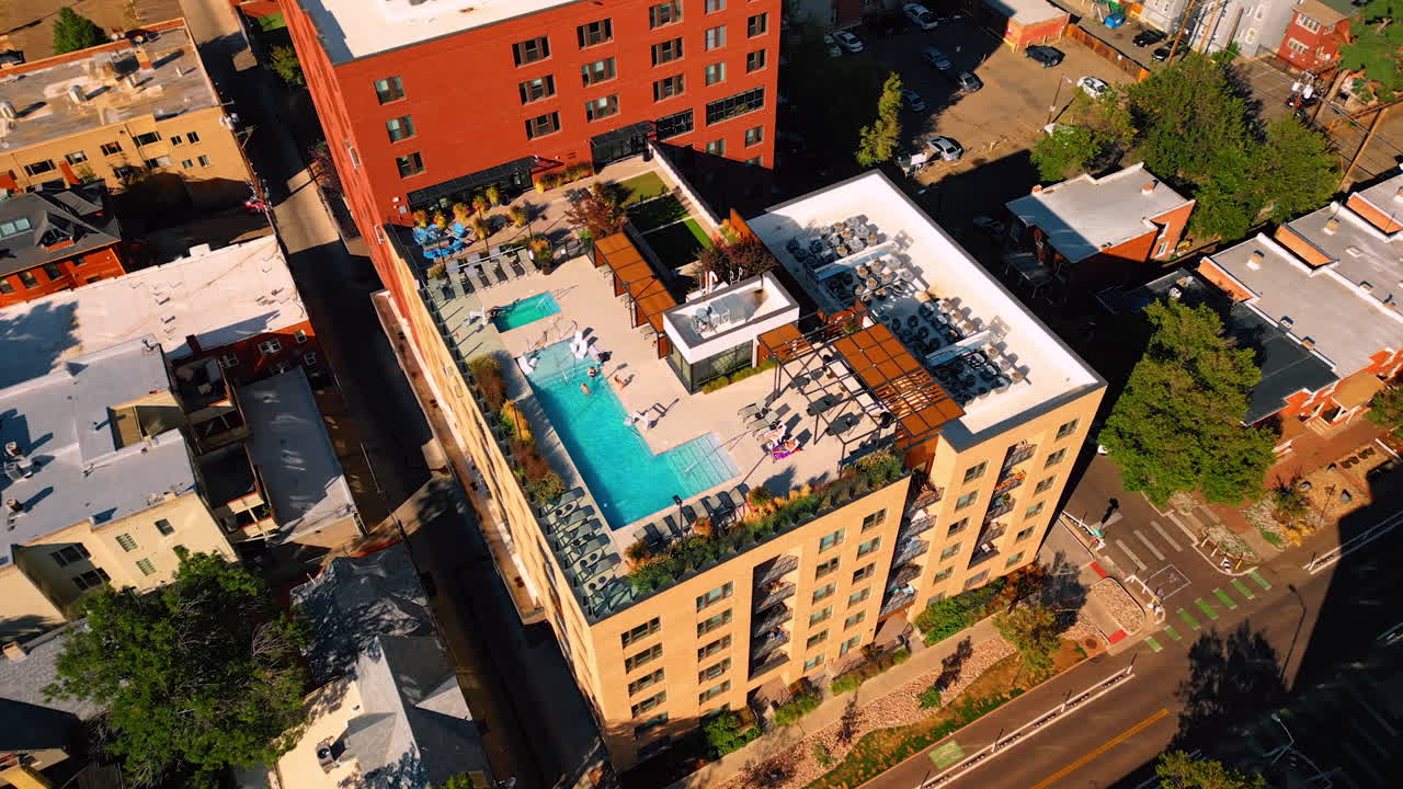 Building with a swimming pool on the roof. Aerial perspective on the neighborhood of Denver, Colorado, USA