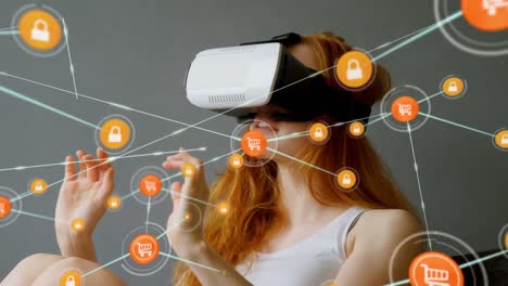 Animation-of-network-of-connections-with-icons-over-woman-wearing-vr-headset