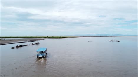 boat-on-tropical-river,-tarcoles-costa-rica,-puntarenas,-mangrove,-forest