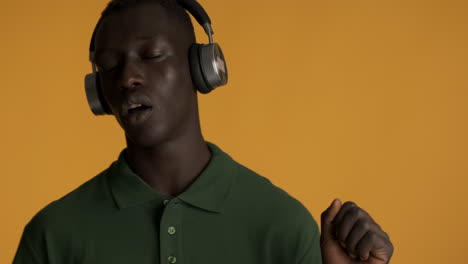 african american man on yellow background.