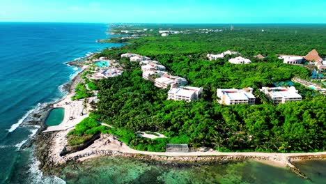 tulum mexico drone flying towards the beach and the tropical forest