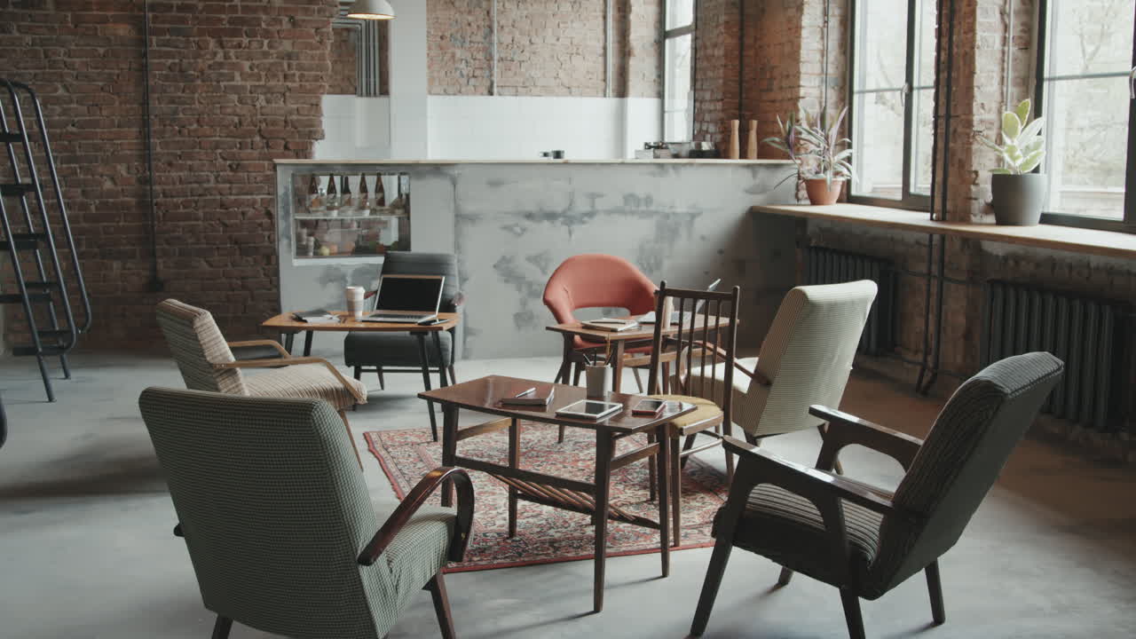 Overview of Loft-Style Workspace with Stylish Chairs
