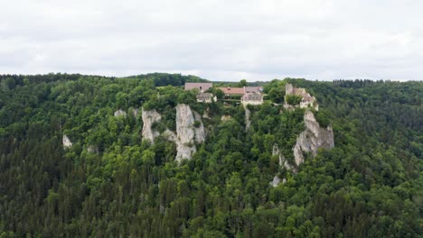 aerial view of historic castle on steep hills in south germany