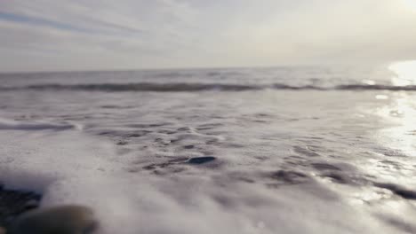 ocean waves on a rocky beach