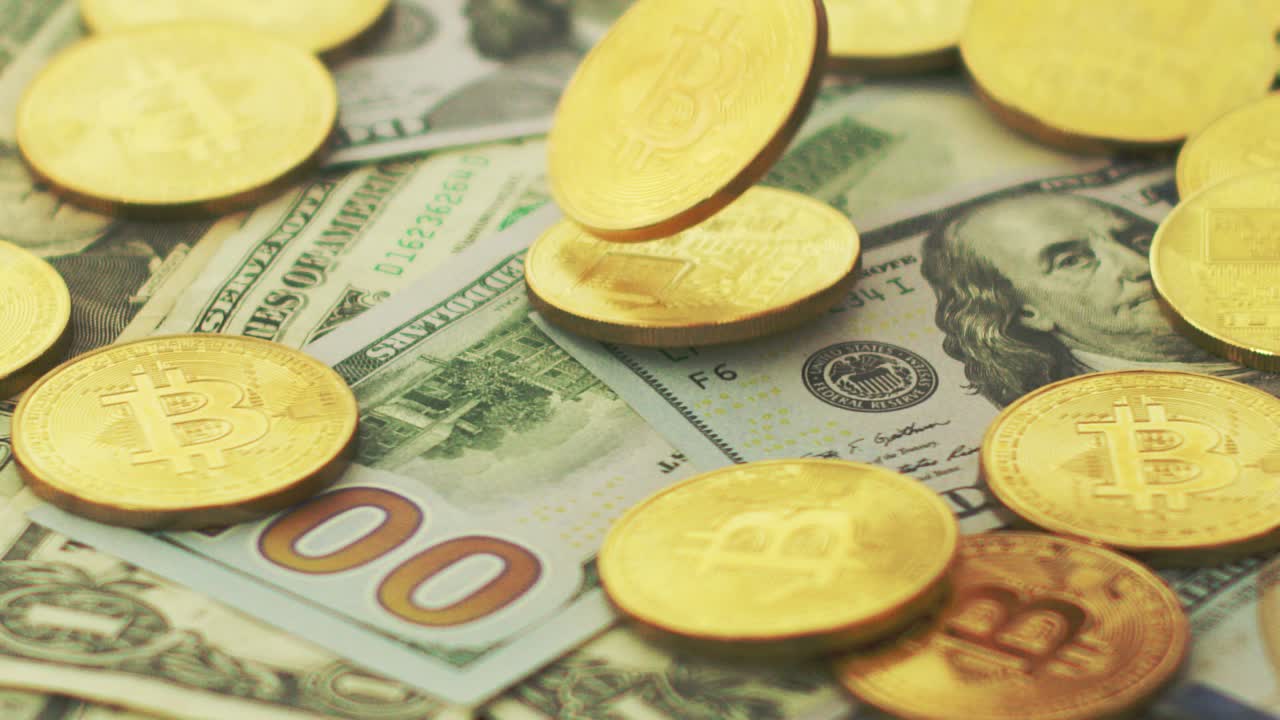 Golden bitcoins and money bills