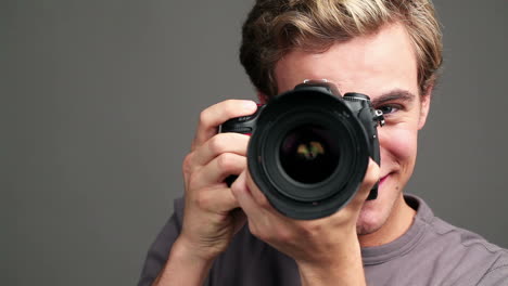 man taking a photo with a camera