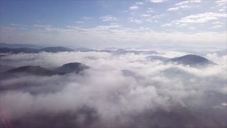 Blanket-of-clouds-over-mountain-peaks-near-Três-Rios,-Rio-de-Janeiro