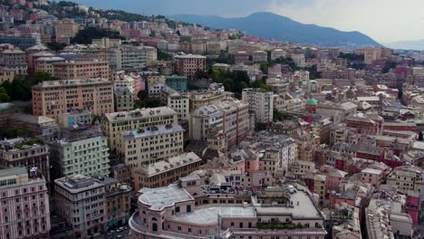 establishing aerial panoramic of the beautiful italy city of genoa