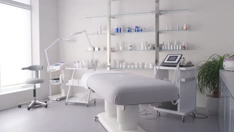 interior of a new beauty salon with a spa massage table and a set of readytouse skin care products interior of a new beauty salon with a spa massage table and a set of readytouse skin care products