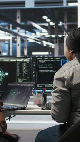 vertical video data center coworkers doing brainstorming, using artificial intelligence