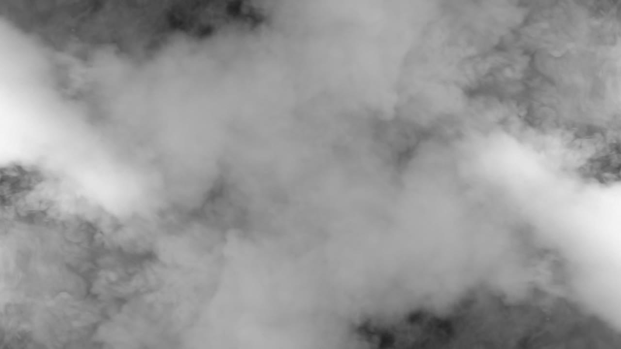 검은 바탕에 두꺼운 연기가 있습니다.