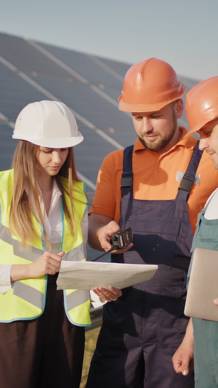 Engineers reviewing plans