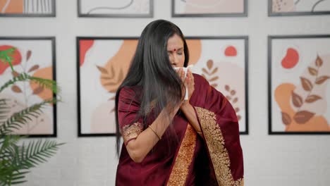 Indian-woman-sneezes-very-hard