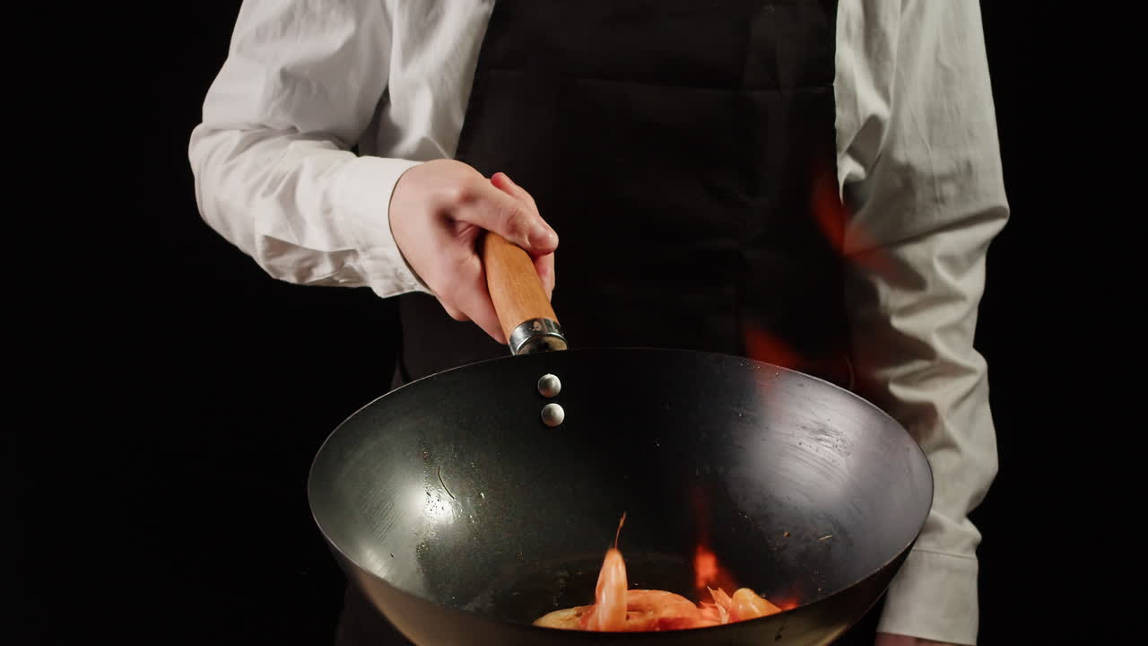Chef Cooking Shrimp in a Wok