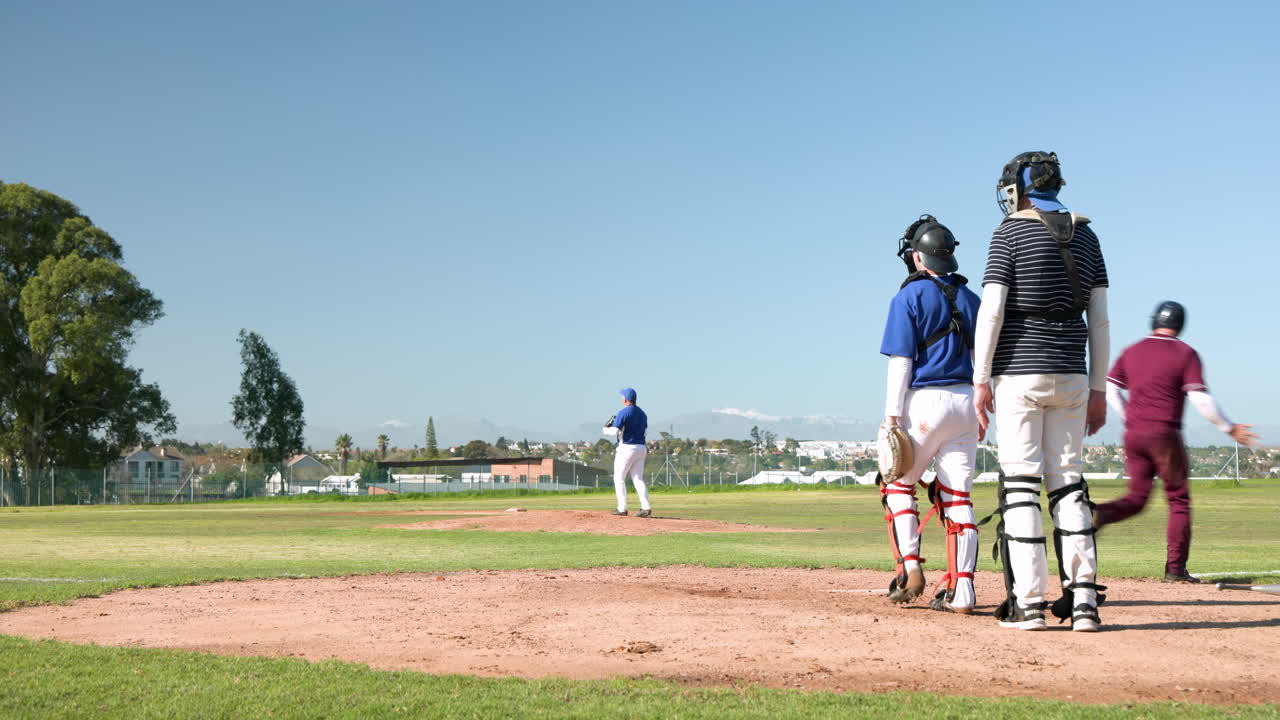 Playing baseball, catcher and batter walking towards pitcher on baseball field