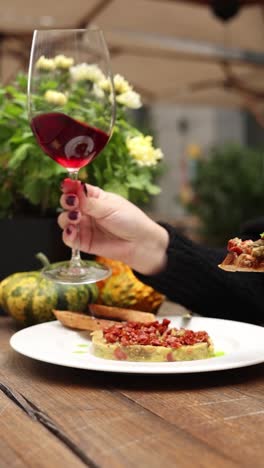 outdoor dining experience with wine and appetizers