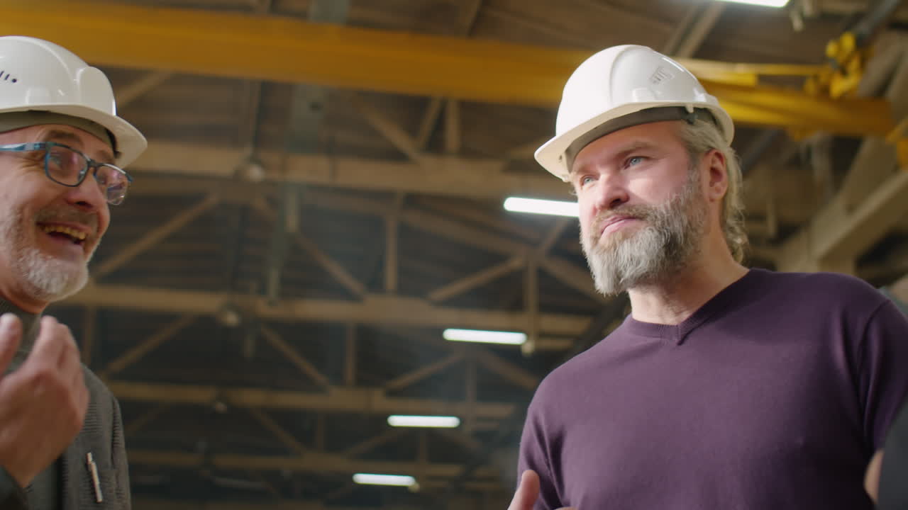 International Team of Factory Engineers Having Discussion