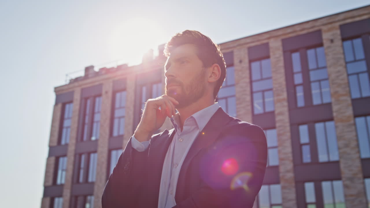 Pensive businessman making decision at sunny terrace closeup. Leader thinking