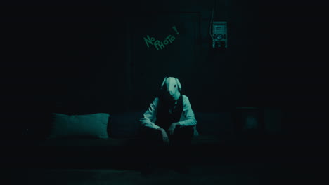 mysterious figure in dark room