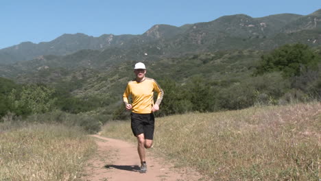 a man trail running on the ventura river preserve in ojai california