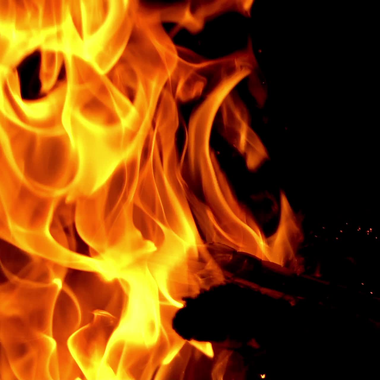 Burning Wood. Flame heats the rural farmhouse. Slow motion