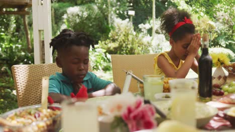 African-American-family-spending-time-in-garden-together