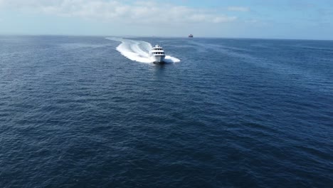 Long-Beach-Aerial-of-Expensive-Super-Yacht-flying-through-the-Pacific-Ocean