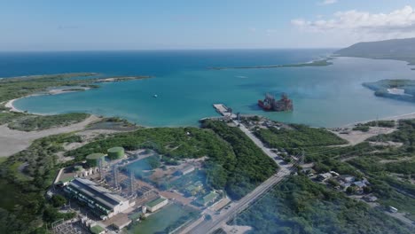 aerial view of power station and puerto de azua with karadeniz powership esra sultan in puerto viejo, dominican republic