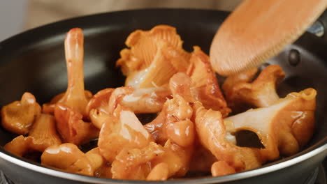 cooking chanterelles in a pan
