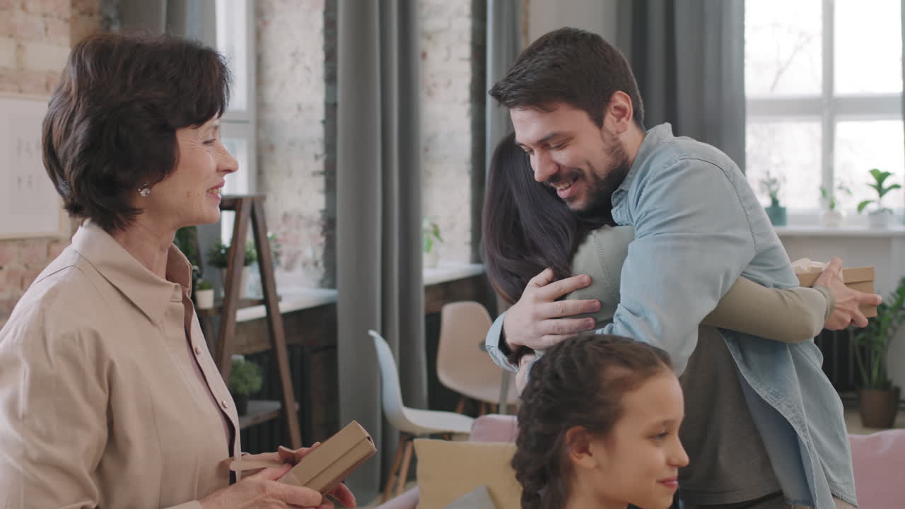 Family exchanging gifts