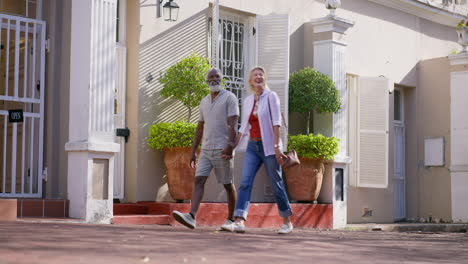 mature couple walking in the street
