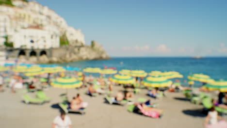 beach, summer and tourists abroad sunbathing using