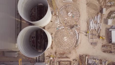 aerial top view of silos in mid-construction phase