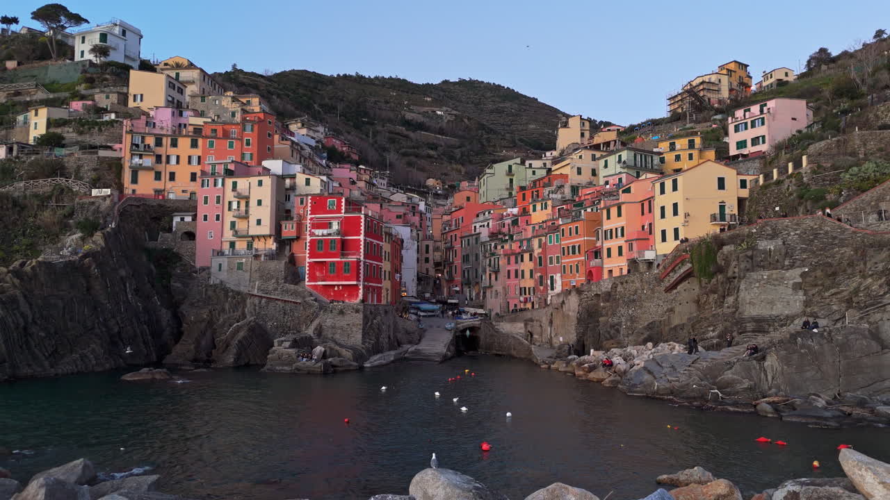 Colorful houses in Riomaggiore, Cinque Terre, nestled along the coastline