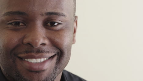 close-u-portrait-attractive-african-american-man-smiling-enjoying-satisfaction-successful-black-male-isolated-on-white-background