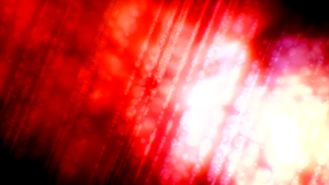 puntos brillantes multicolores y no enfocados en una fila diagonal como el bucle de fondo de vídeo bokeh 4k - rojo, amarillo