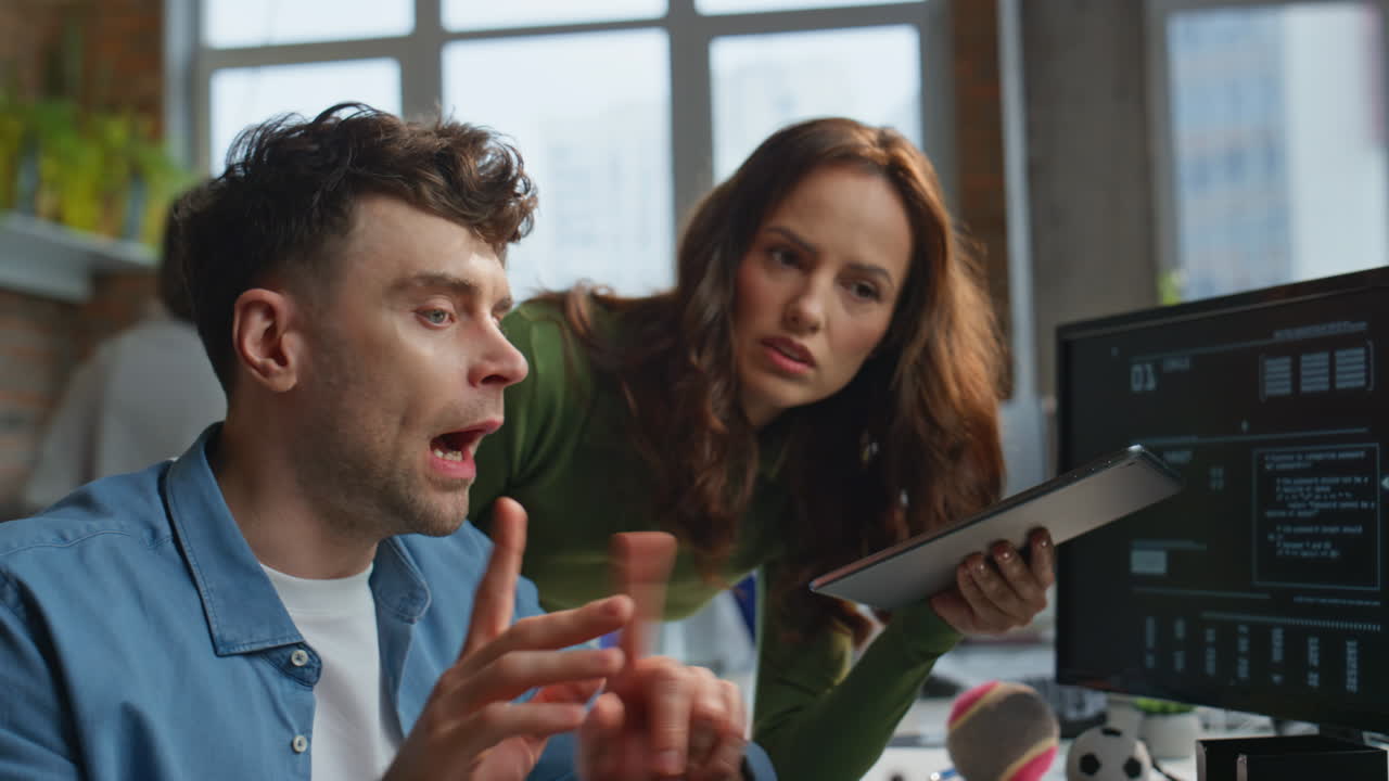 Stressed business partners working at big cabinet closeup. Shocked boss talking