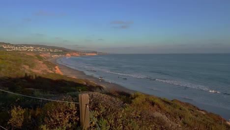 Crystal-Cove-State-Park-in-Corona-Del-Mar-California-handheld-static-view-of-the-rocks,-cliffs,-and-small-waves-of-the-pacific-ocean